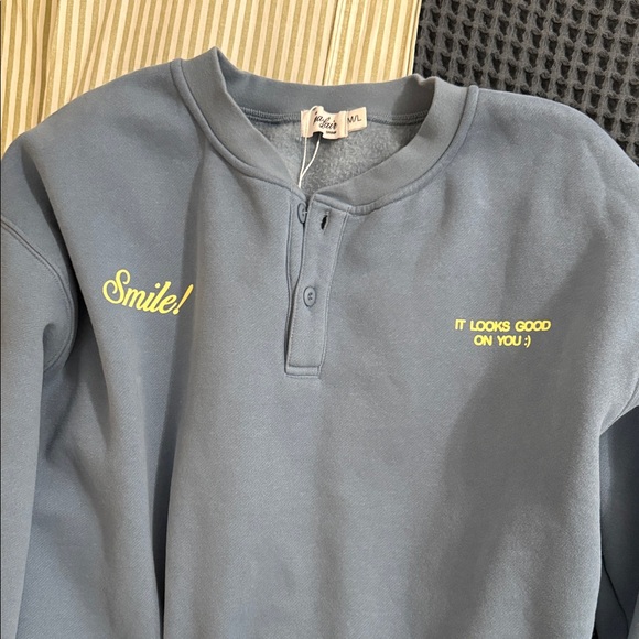 Blue Sweatshirt with Yellow Text - Picture 2 of 2